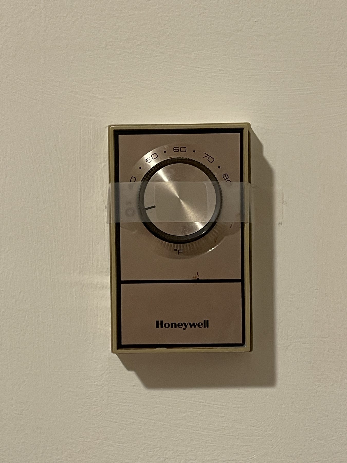 Taped Over Thermostat Dial