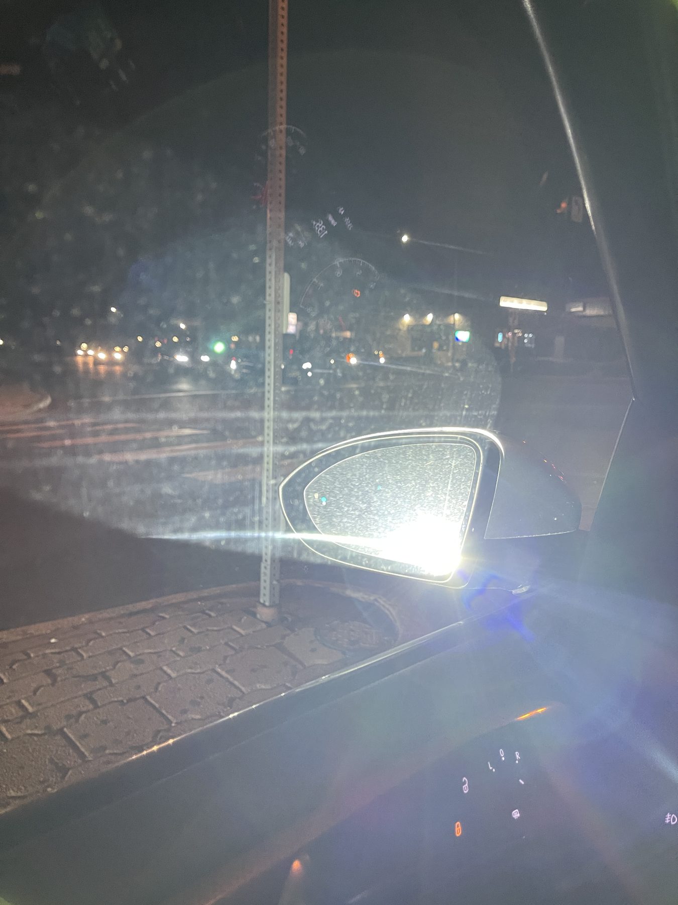 Bright LED headlights reflected into a wing mirror